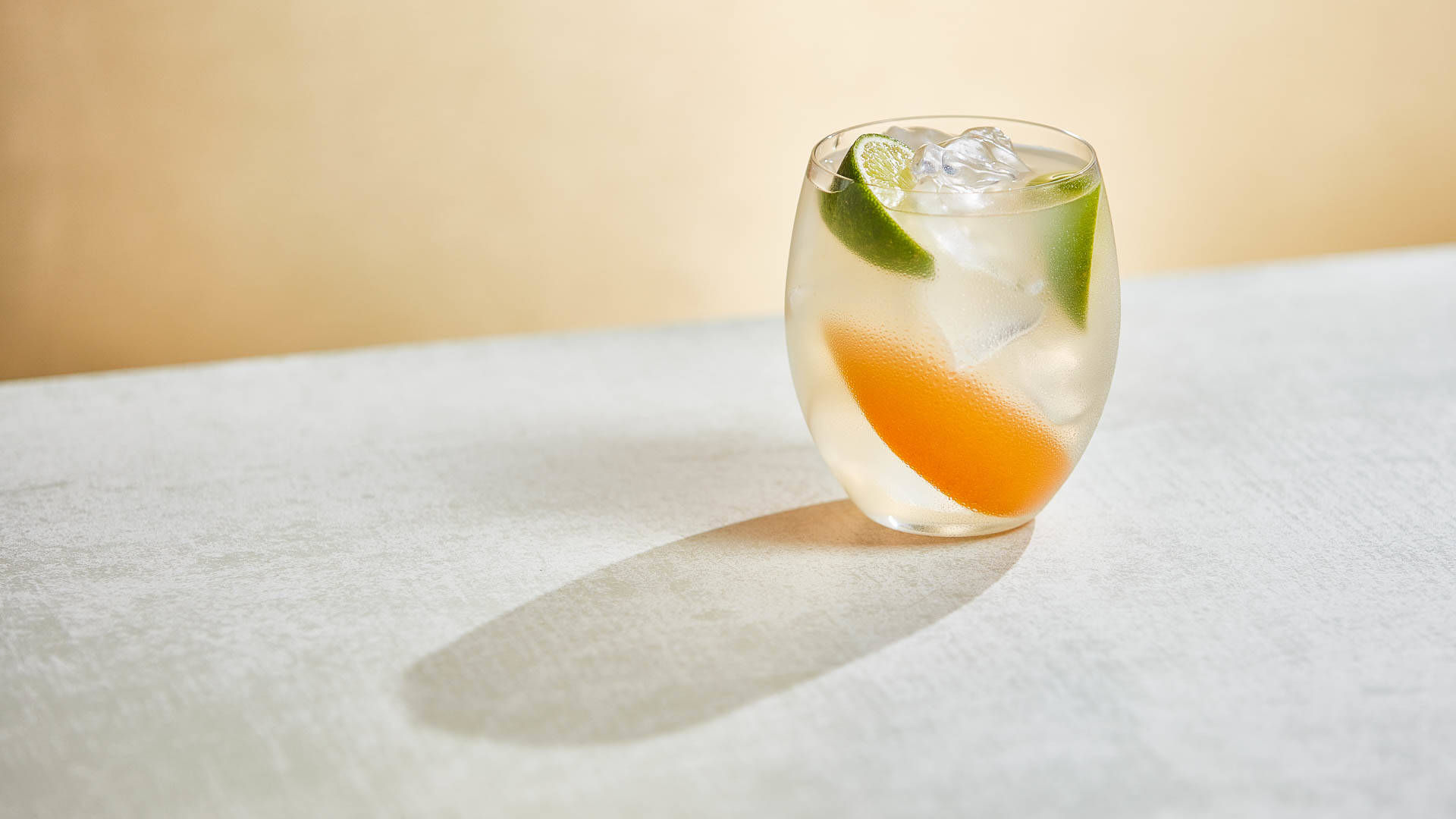 Glass of Sweet Seduction on a stone surface