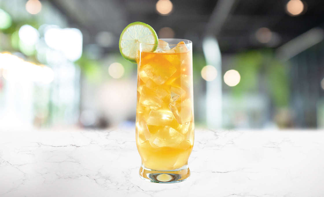 glass of Rum Punch on a marble surface