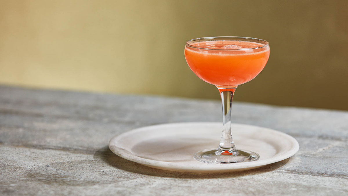 Glass of Pink Grapefruit Daiquiri on a plate