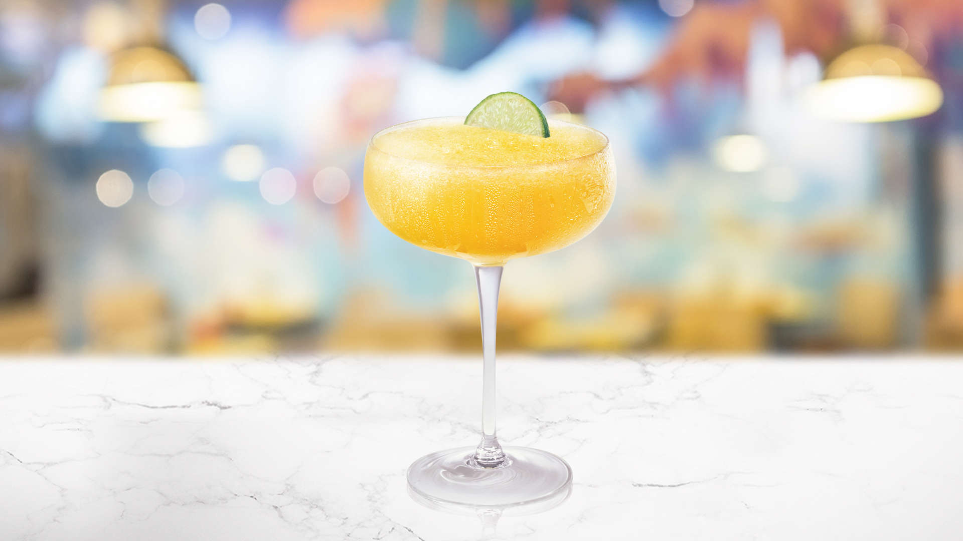 Glass of Caribbean Delight on a marble surface
