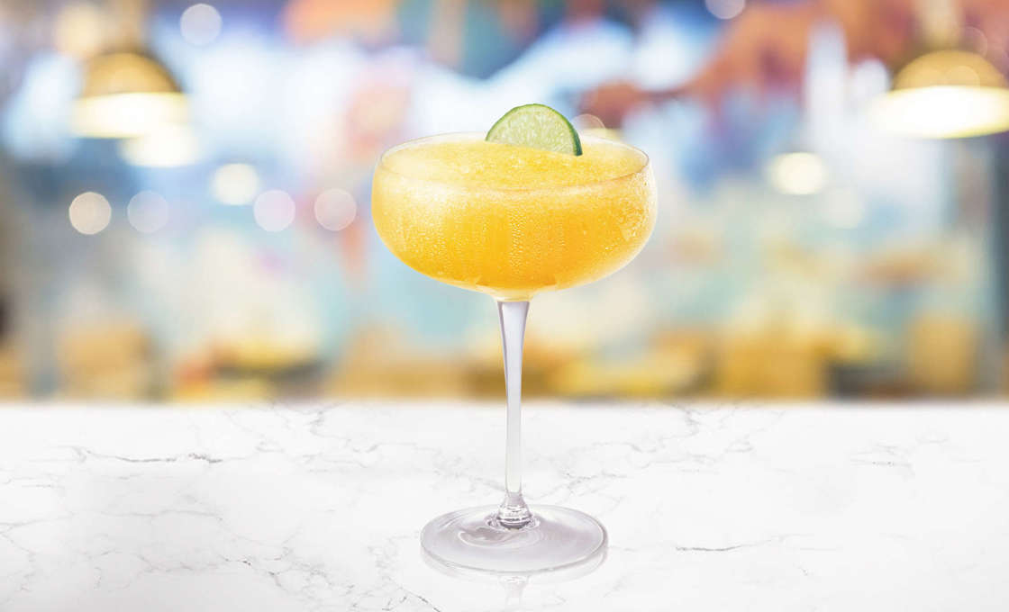 Glass of Caribbean Delight on a marble surface