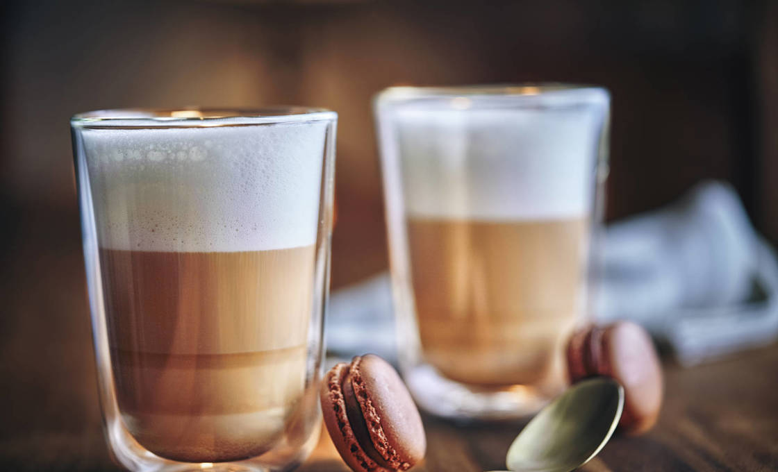 Two glasses of Fruit macchiato with macarons