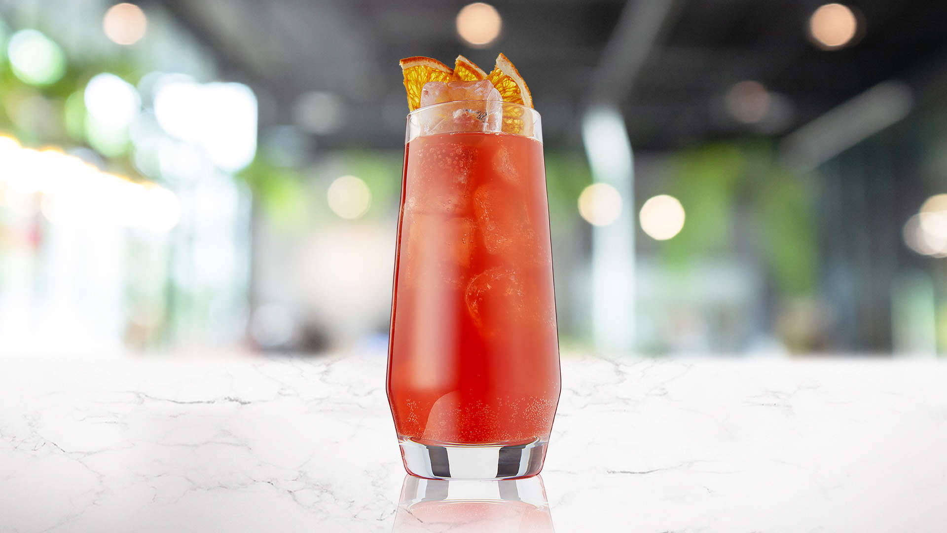 Glass of Rhubarb limeade on a marble surface