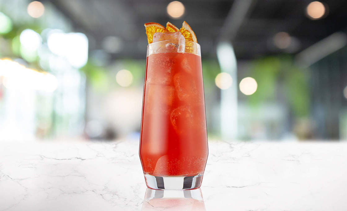 Glass of Rhubarb limeade on a marble surface