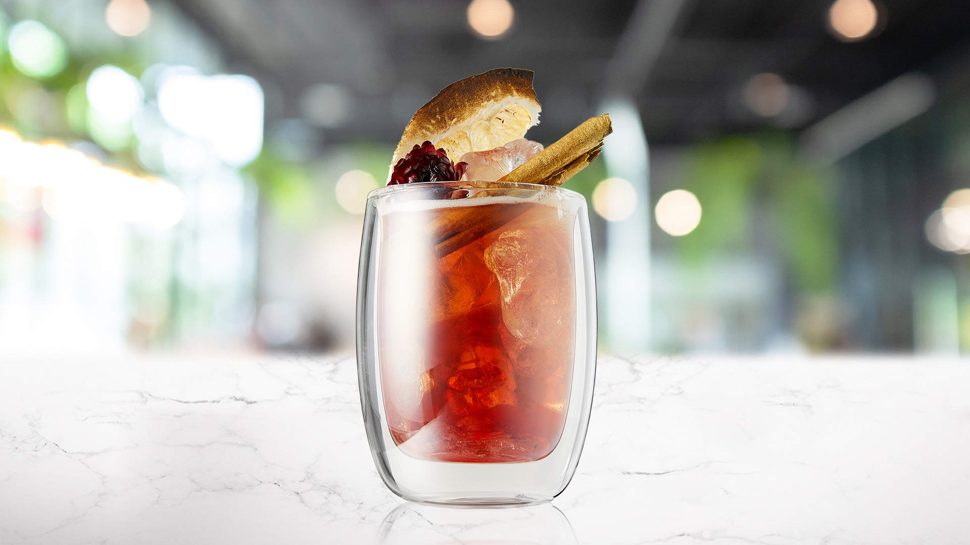 Rhubarb Honey Shaken tea on a marble counter