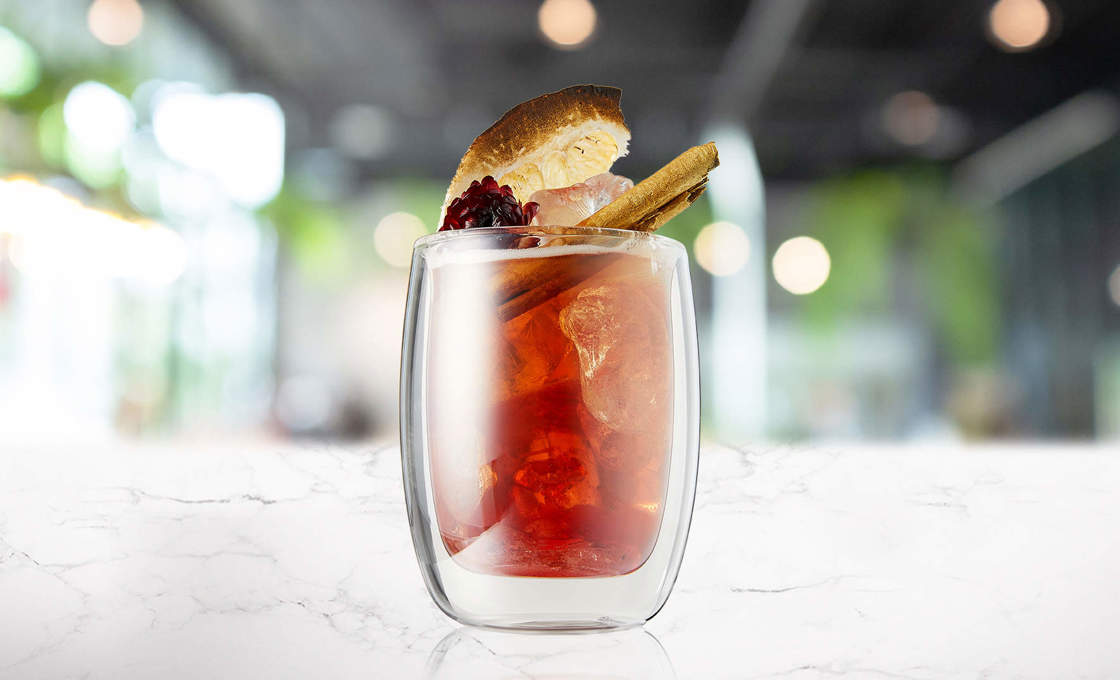 Rhubarb Honey Shaken tea on a marble counter