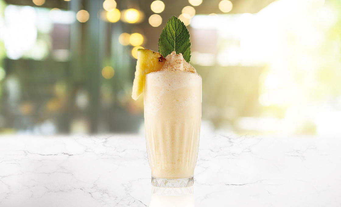 A glass of Coco Loco with garnish