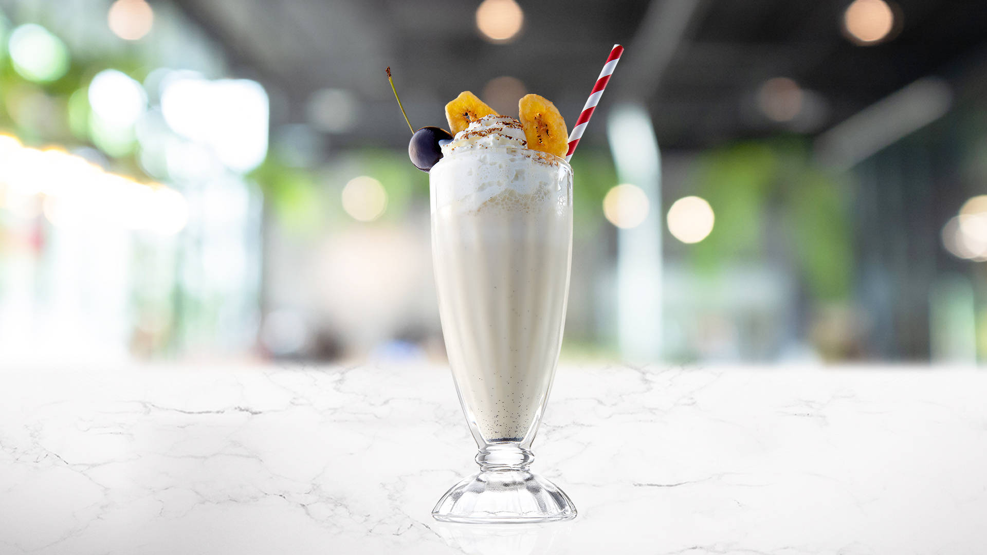 Class of Okinawa Cheese Frappe on a marble surface